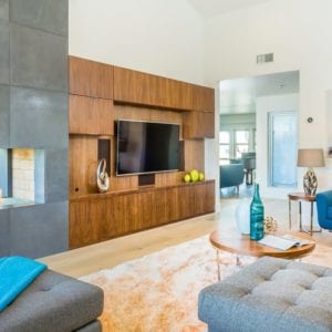 Captivating mid-century remodel family room in Westlake Village by JRP Design and Remodel
