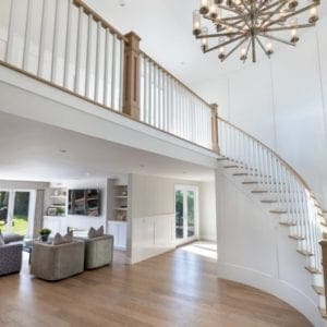 Transitional glam entry way and stairs remodel in Westlake Village by JRP Design and Remodel