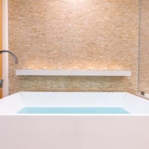 Contemporary master bathroom tub remodel by JRP Design and Remodel in Malibu