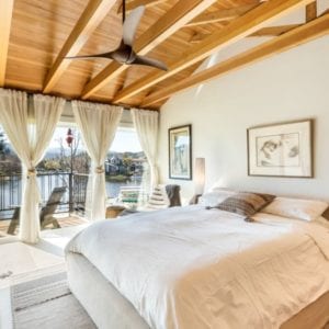 Contemporary lakeside master bedroom remodel in Westlake Village by JRP Design & Remodel
