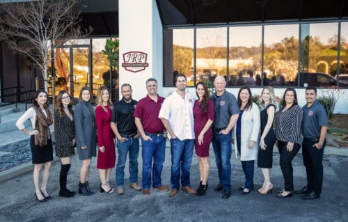 JRP Design and Remodel team photo in front of showroom