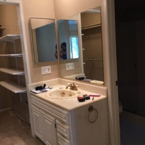 Before photo of minimal all white bathroom renovation by JRP Design and Remodel in Westlake Village