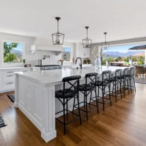 All white Open Brookview kitchen remodel with bi fold doors in Westlake Village By JRP Design and Remodel