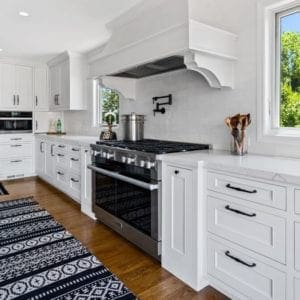 All white transitional kitchen remodel with matte black fixtures in Westlake Village By JRP Design and Remodel