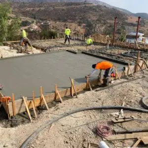 Concrete construction photo of Carrita Seaview Malibu custom home by JRP Design and Remodel