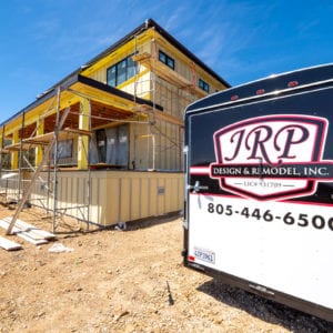 Trailer and construction photo of Malibu custom home by JRP Design and Remodel