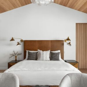 Rustic custom primary bedroom in North Ranch by JRP Design and Remodel
