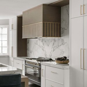 Modern kitchen with marble countertops, white cabinets, a stainless steel stove, brass fixtures, and pendant lights over an island. Large windows provide natural light, enhancing the sophisticated glamour of the space.