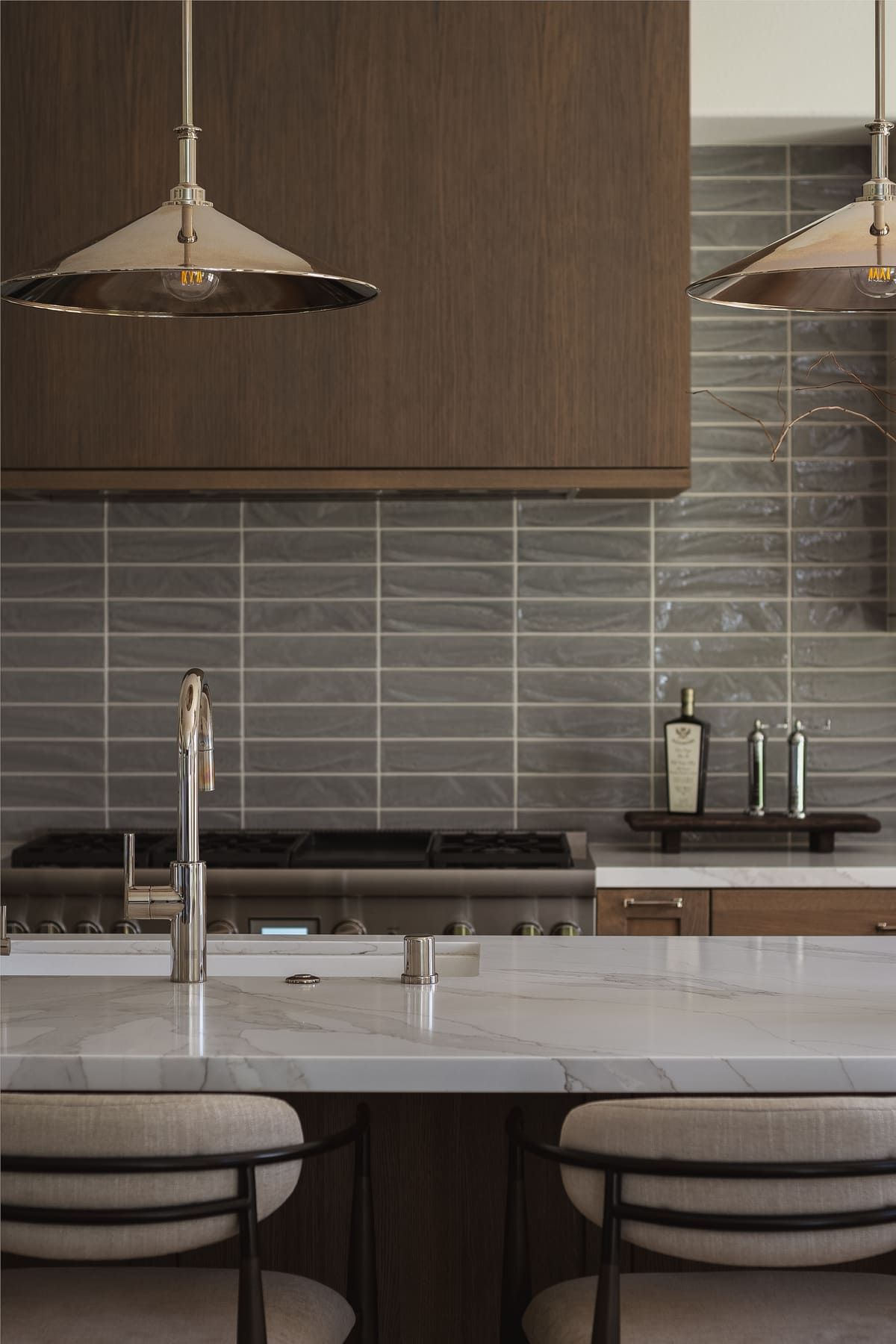 Perfectly Polished Kitchen remodel featuring a large island, modern coffee bar, sleek cabinetry and polished nickel accents, by JRP Design and Remodel.
