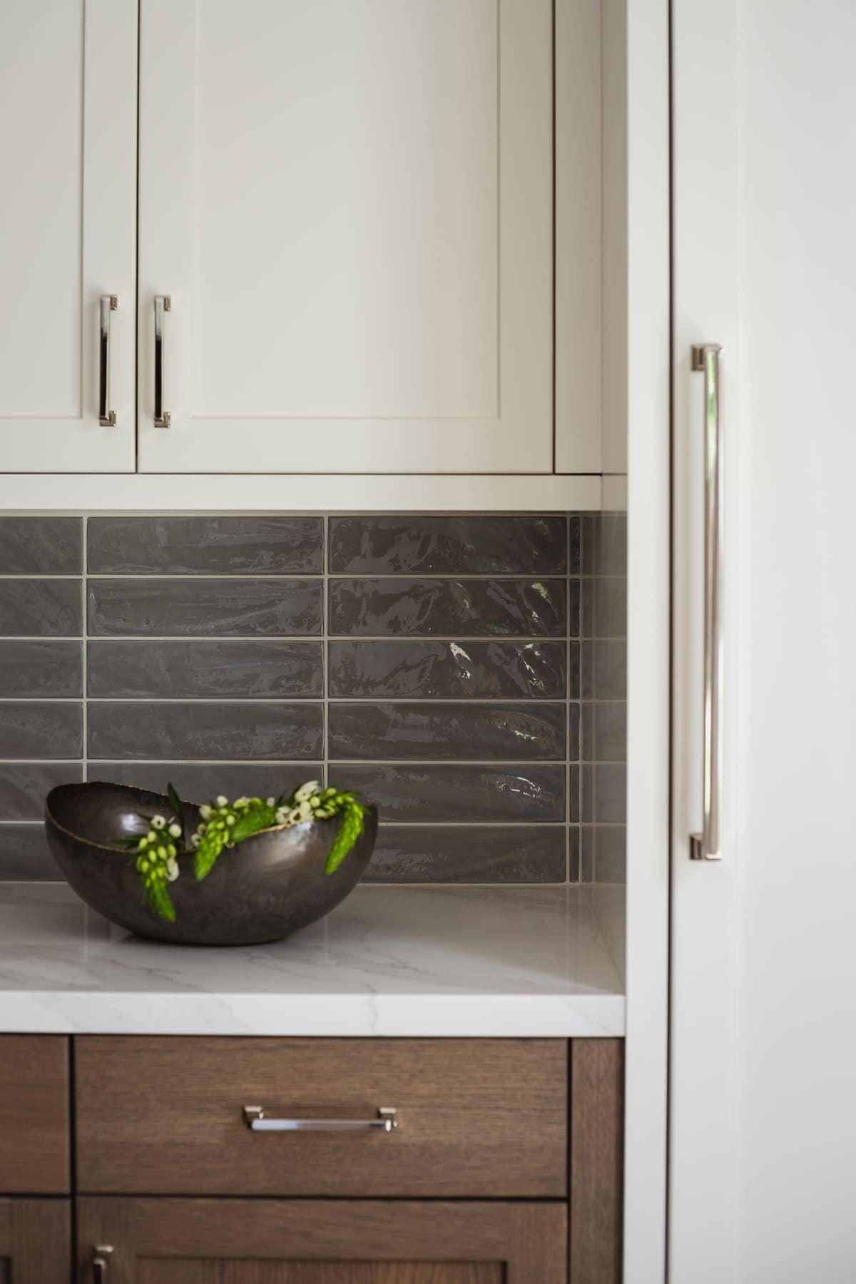 Perfectly Polished Kitchen remodel featuring a large island, modern coffee bar, sleek cabinetry and polished nickel accents, by JRP Design and Remodel.
