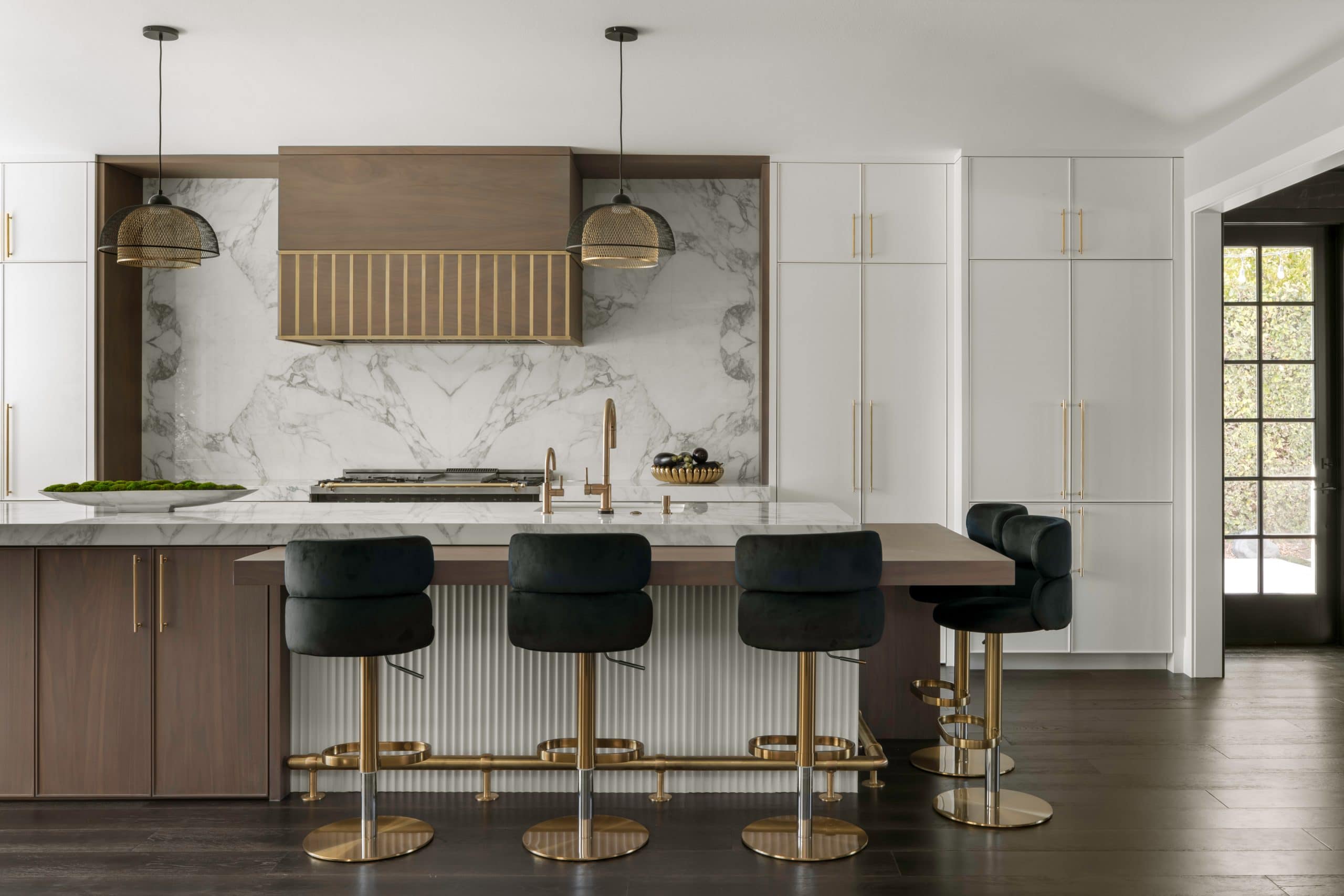 Agoura Hills contemporary Sophisticated Glamour home transformation by JRP Design & Remodel. Featuring an open-concept design, a dramatic custom kitchen, and sophisticated, moody interiors.