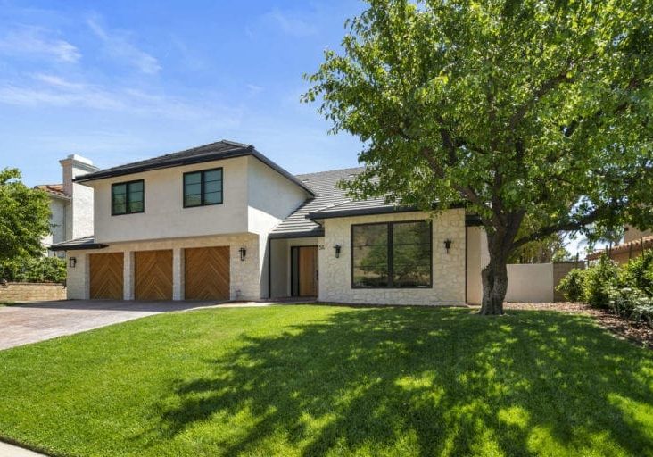Contemporary exterior in Oak Park by JRP Design and Remodel