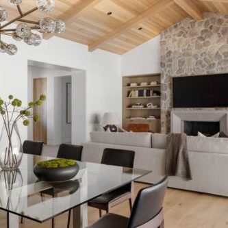 Rustic custom family room in North Ranch by JRP Design and Remodel