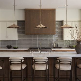 Perfectly Polished Kitchen remodel featuring a large island, modern coffee bar, sleek cabinetry and polished nickel accents, by JRP Design and Remodel.
